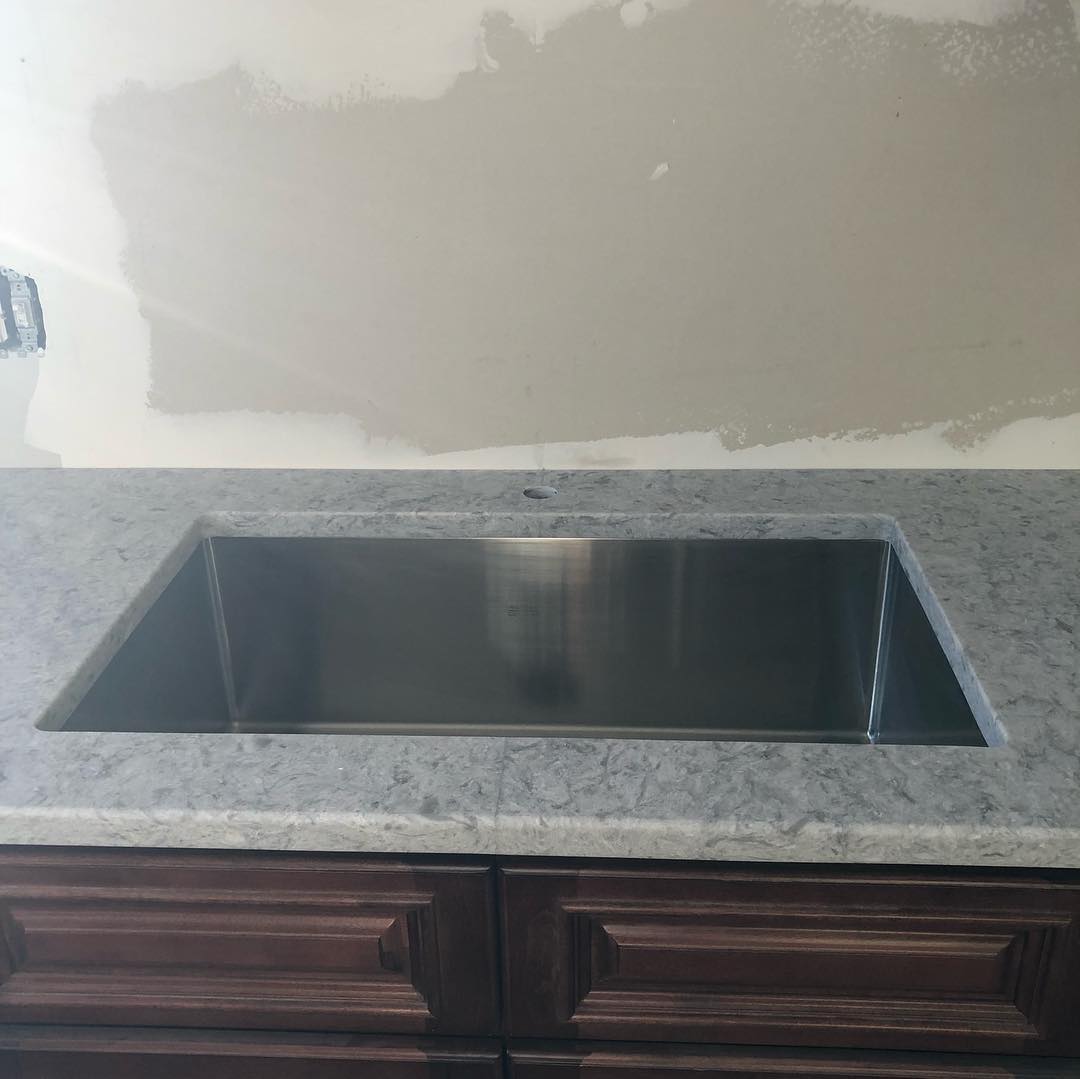 - 3 Custom granite kitchen sink installed in a modern countertop by Pablo Marble and Granite