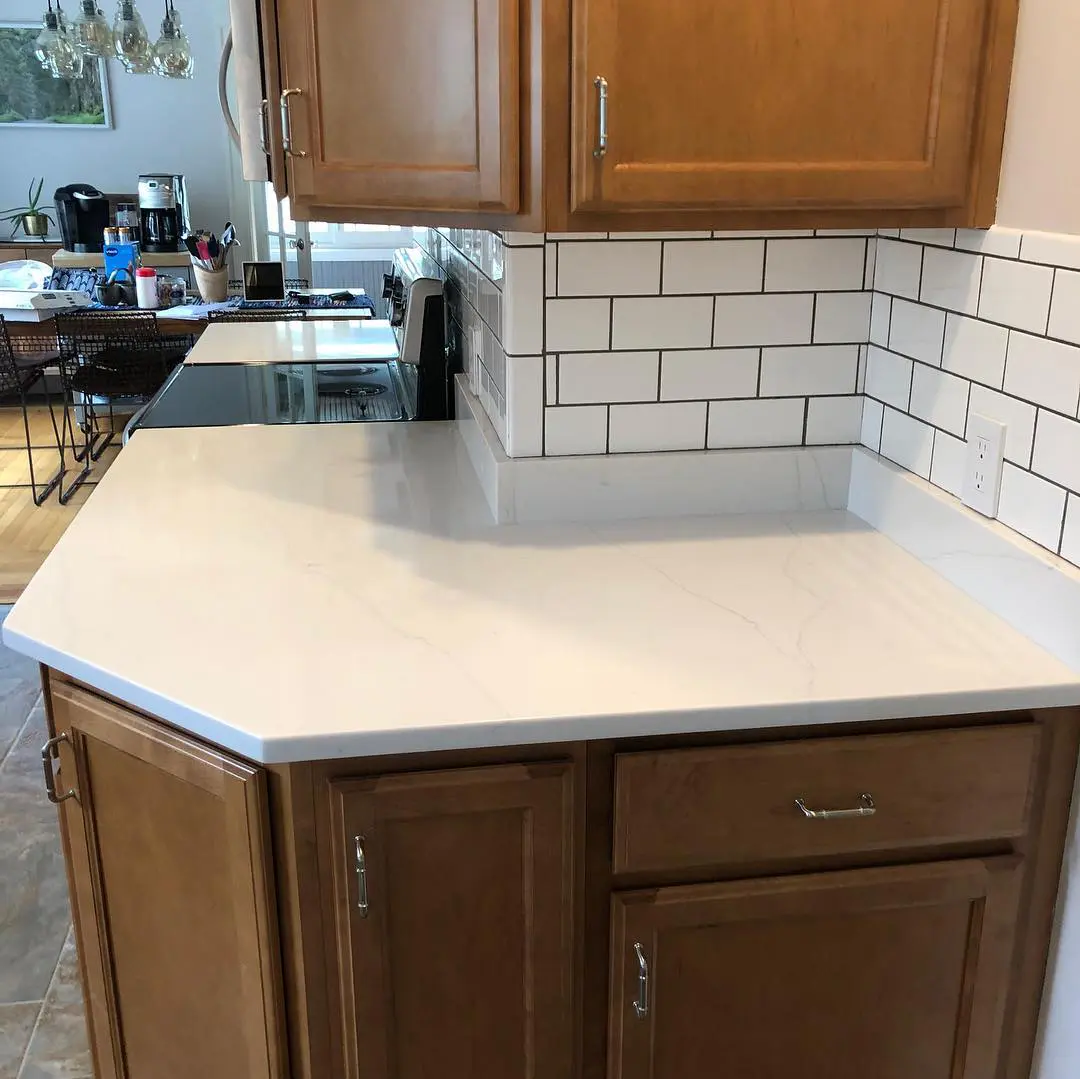 - 3 White marble kitchen countertop with backsplash
