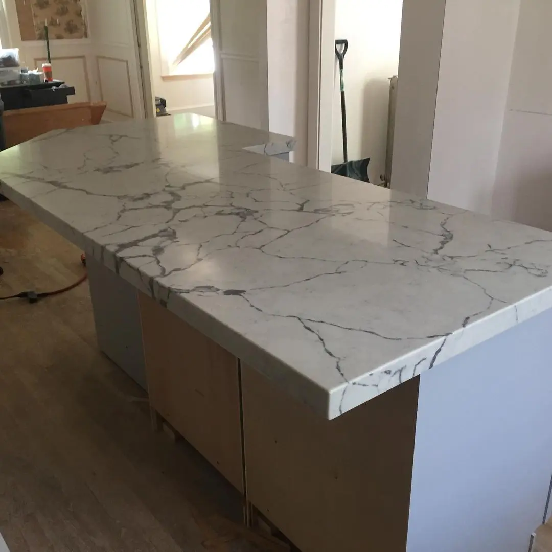 - 4 Polished marble kitchen island with gray veining