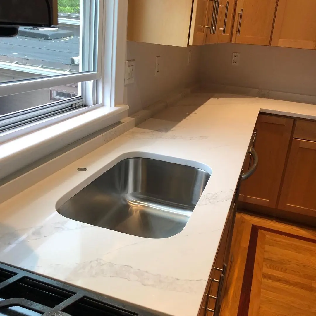 - 5 White marble countertop with stainless steel sink