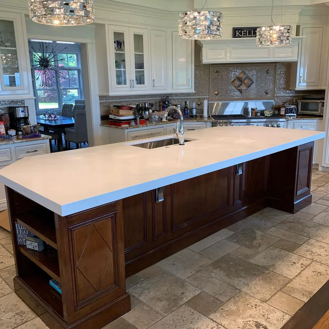 - 2 Marble kitchen island with dark wood base