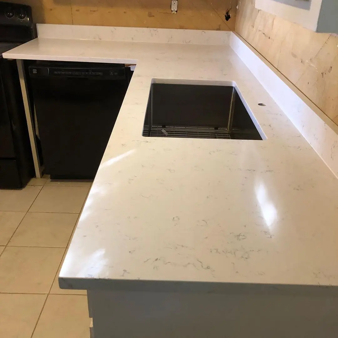 - 4 White granite kitchen countertop with cooktop
