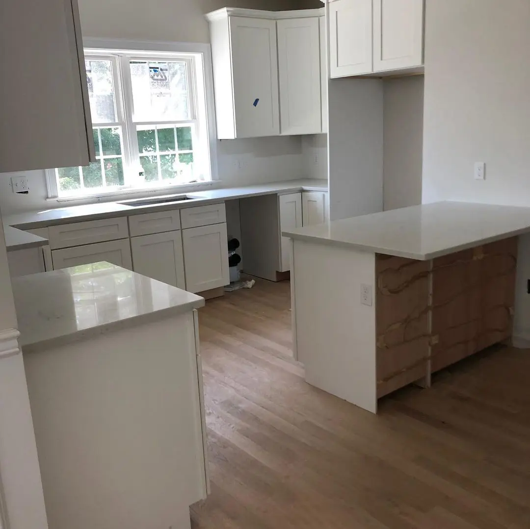 - 5 Modern kitchen with marble countertops and white cabinetry