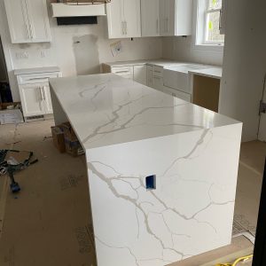 - 9 Waterfall Island Countertops - Pablo Marble and Granite, LLC