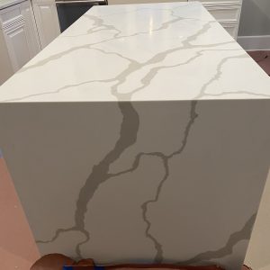 - 11 Waterfall Island Countertops - Pablo Marble and Granite, LLC